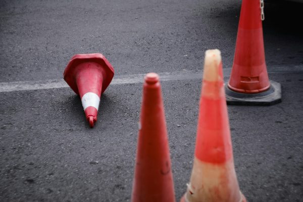 a group of orange cones on the ground